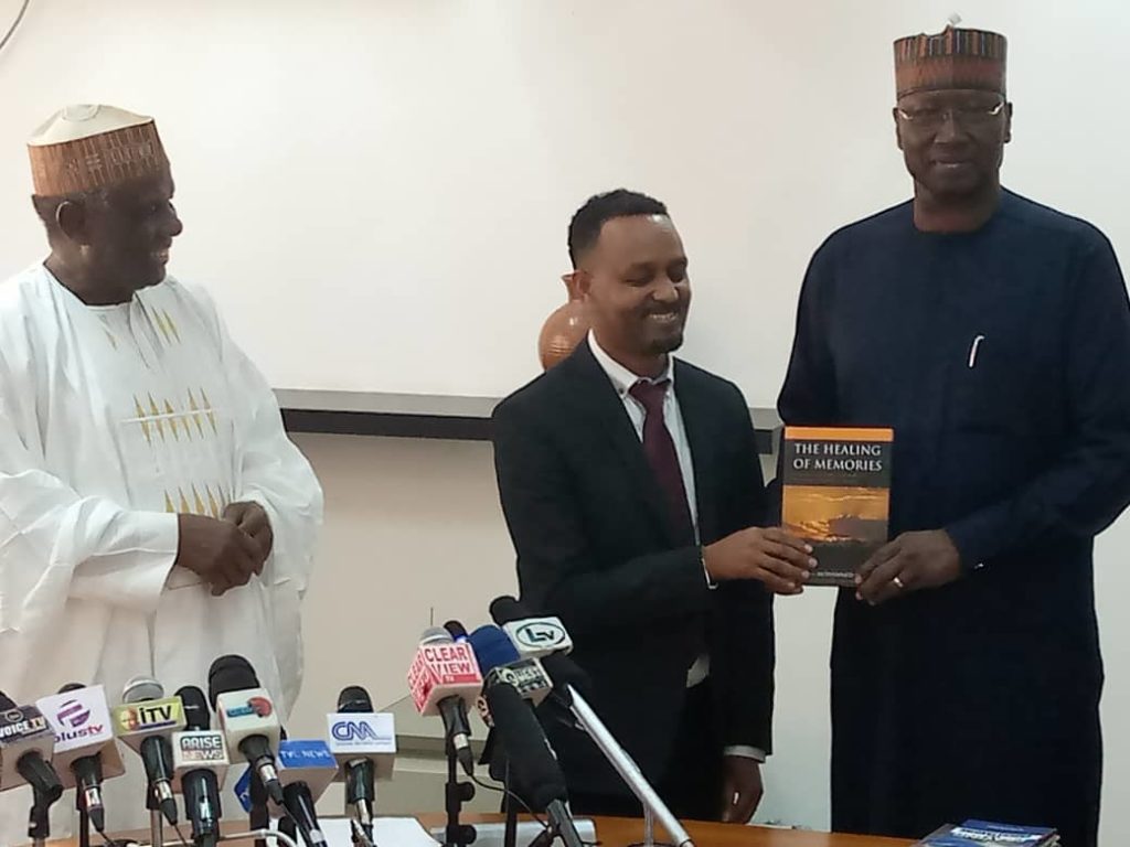 Photo Scope: Chairman, Central Working Committee, African Bible Leadership Initiative, Prof. Jerry Gana (l) applauds as the SGF, Mr. Boss Mustapher