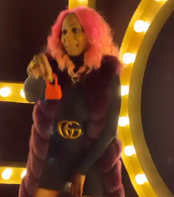 DJ Cuppy flaunts her miniature bag worth over N180k, reveals what she kept inside (Video)