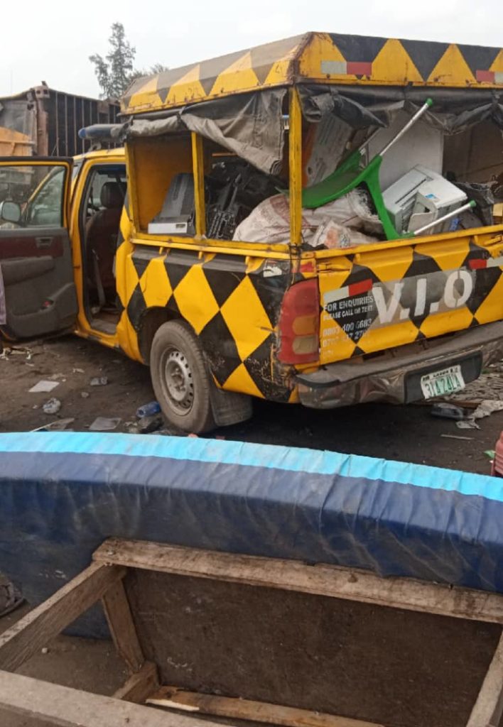 PHOTO STORY: Demolition of illegal structures around Mile 2 by LASG