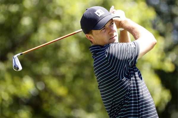 Golf: Spieth keeps his cool to overcome hiccup