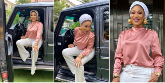 Fans React As Tonto Dikeh Poses With Newly Acquired G Wagon