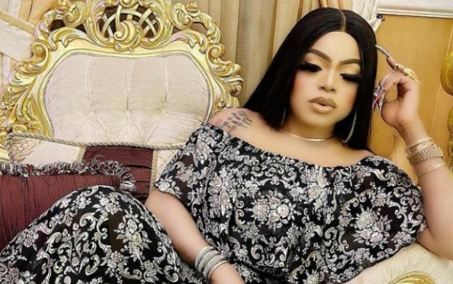 Shocking: Lady Who Tattooed Bobrisky At Her Back Attacked By Area Boys