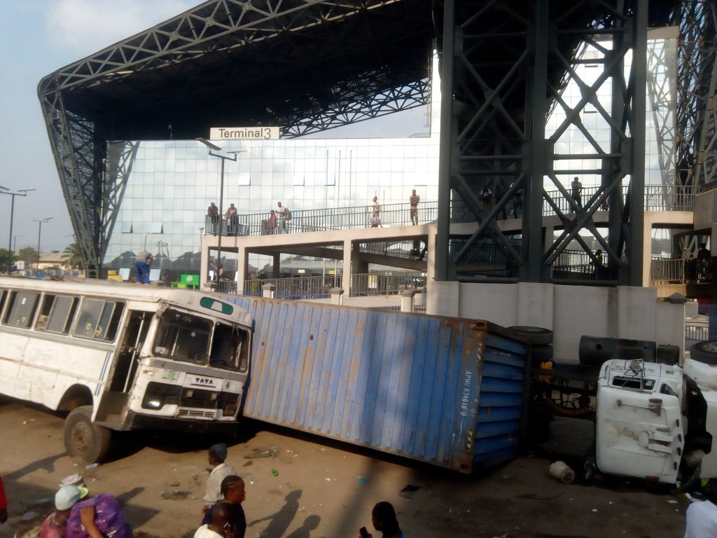 PHOTOS: Another Container Crushes Commercial Bus In Lagos