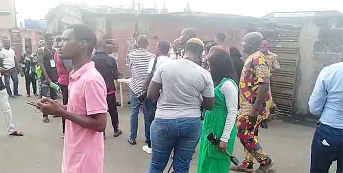 voters waiting for electoral officials to arrive