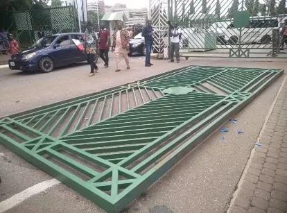 #Protest: NLC Members Break Down National Assembly Gate