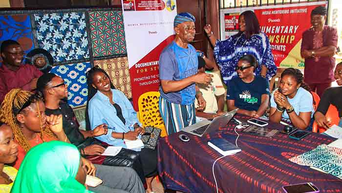 Tunde Kelani training the MMi-DFS students fellows on the use of mobile phones for documentary filmmaking